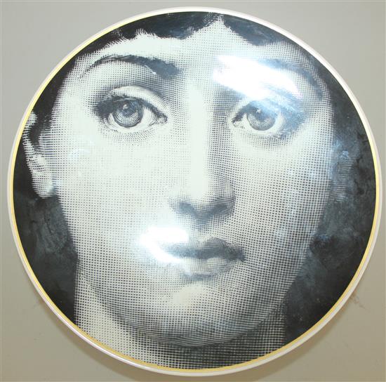 A collection of Fornasetti Temi e Variazioni and musical trophy pattern items,